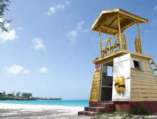 Wooden lifeguard tower on a sunny beach